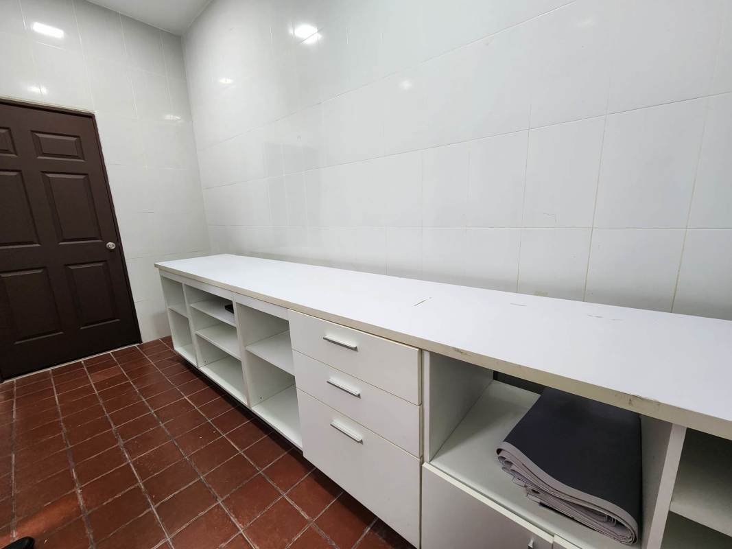 Modern commercial building exterior Torre Banesco with glass facade and stone details Panama City