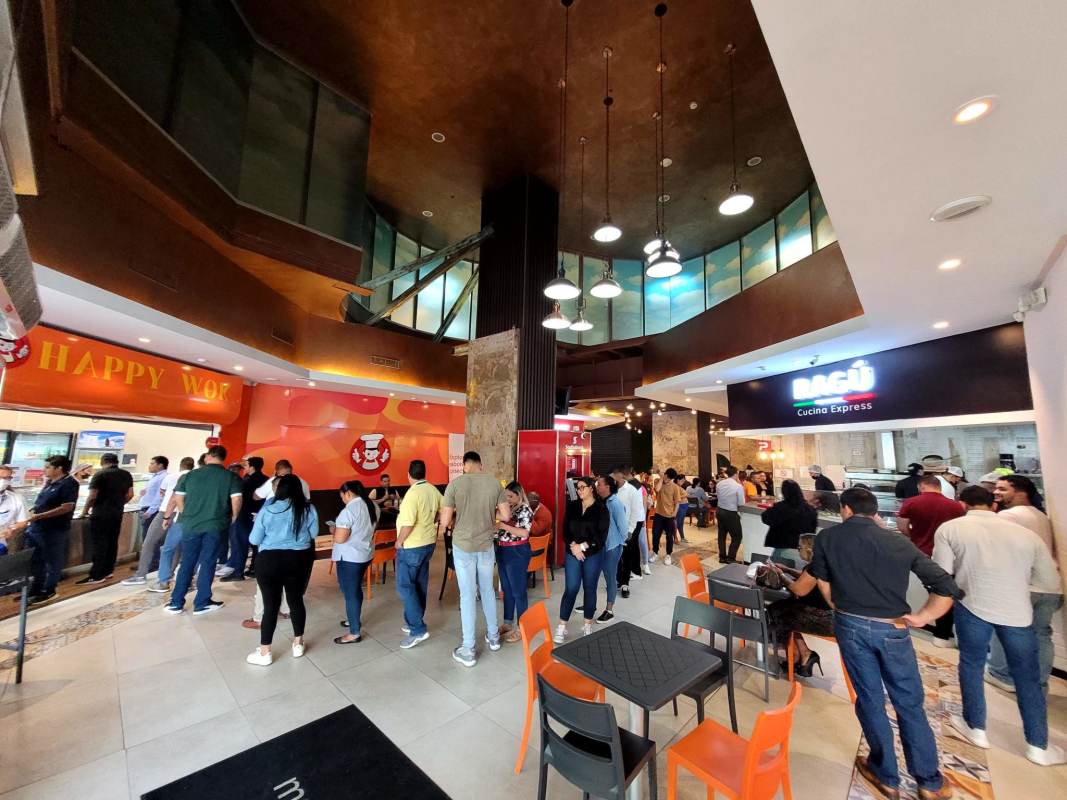 Dining seating area with colorful design in Mercato Food Court at Torre Banesco Panama City