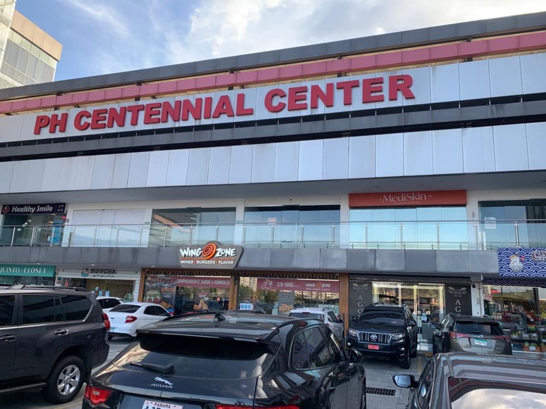 Retail or office unit with glass front and outdoor corridor at PH Centennial Center in Condado del Rey Panama