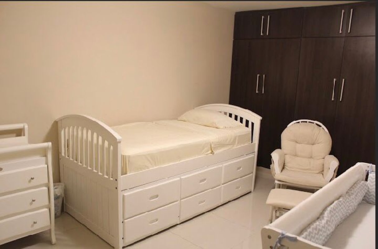 Small bedroom with built-in closet and storage PH Royal Princess Punta Paitilla Panama