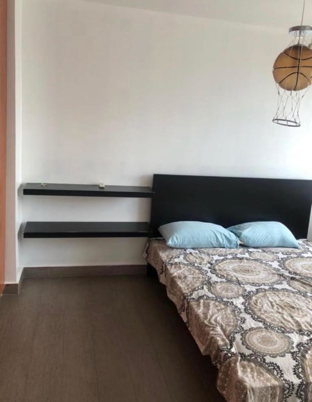 Children's room with minimalist furniture, wall shelves and playful decor PH San Francisco Panama rental