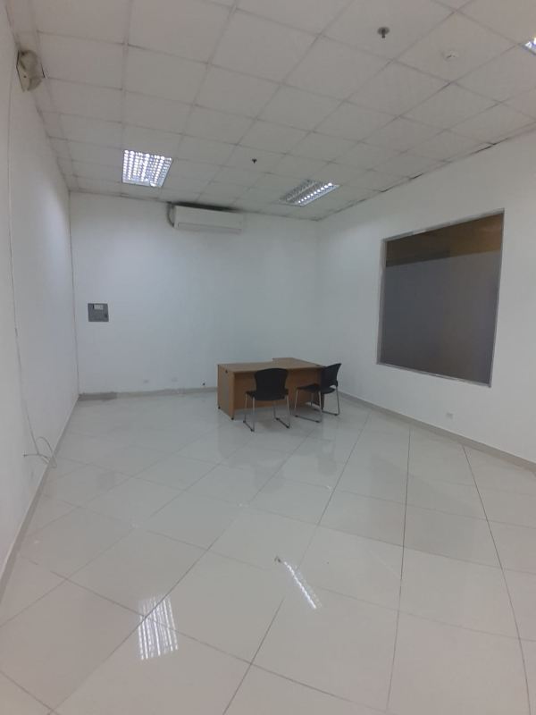 Spacious commercial unit interior with white tiles near Tocumen Airport at Plaza Tocumen Panama