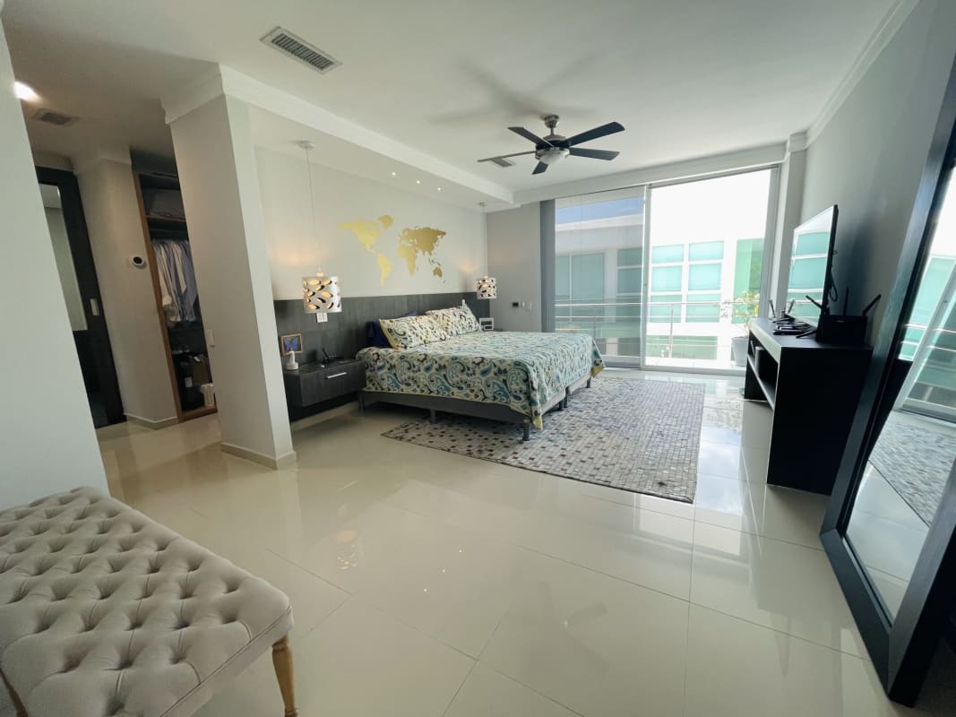 Spacious master bedroom with large windows, walk-in closet, jacuzzi tub in PH Costa Esmeralda Panama City