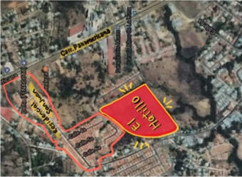 Large grassy open field suitable for development with trees and mountain view in Santiago Panama