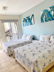 Fully equipped kitchen with island breakfast bar in luxury beachfront condo Panama