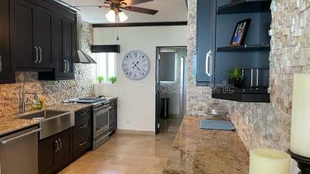 Spacious dining area panoramic lagoon ocean views penthouse Playa Blanca Panama resort
