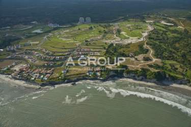 Luxury resort condos and golf course by the ocean at Vista Mar Panama aerial view