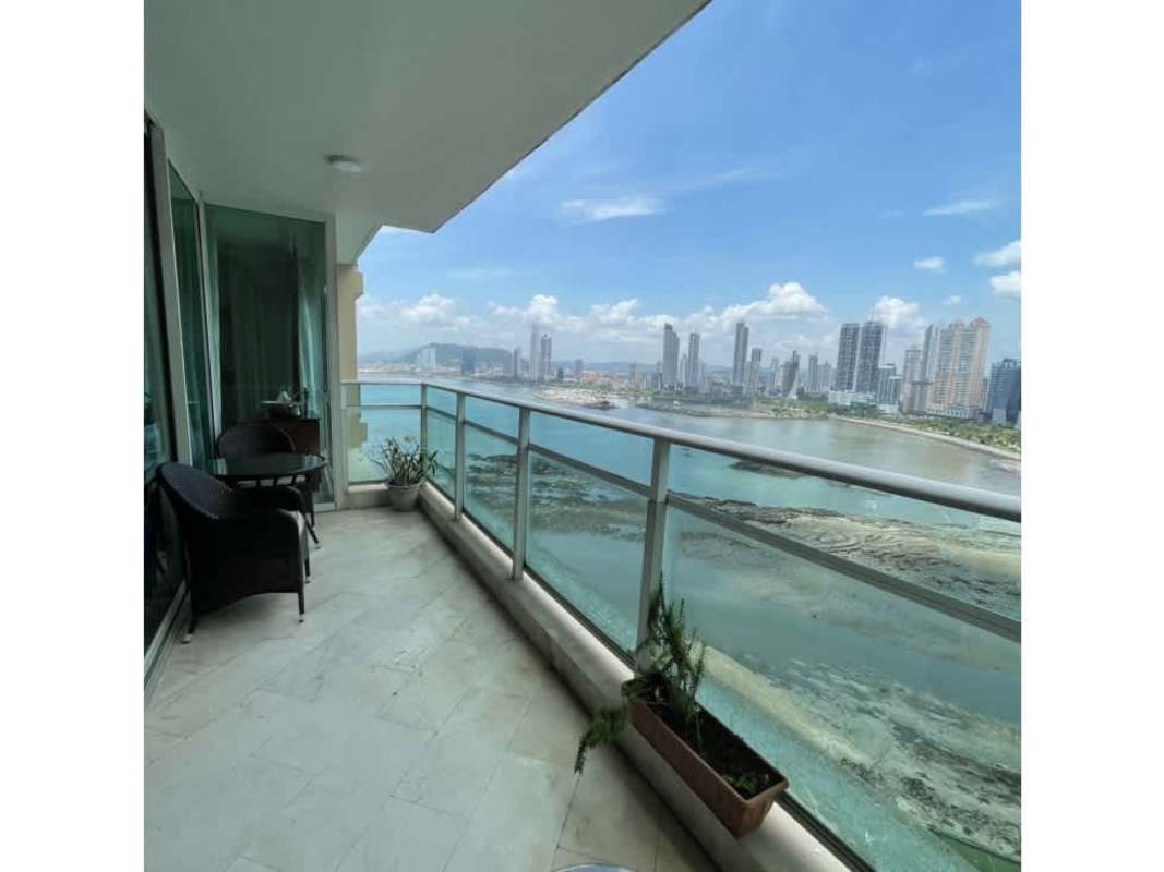 Luxury dining space with wall mural, marble floor and chandelier Punta Paitilla Panama