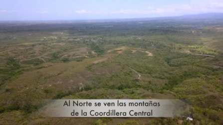 Aerial photo of dense green acreage with glimpses of Pacific Ocean and Cordillera views in Coclé Panama