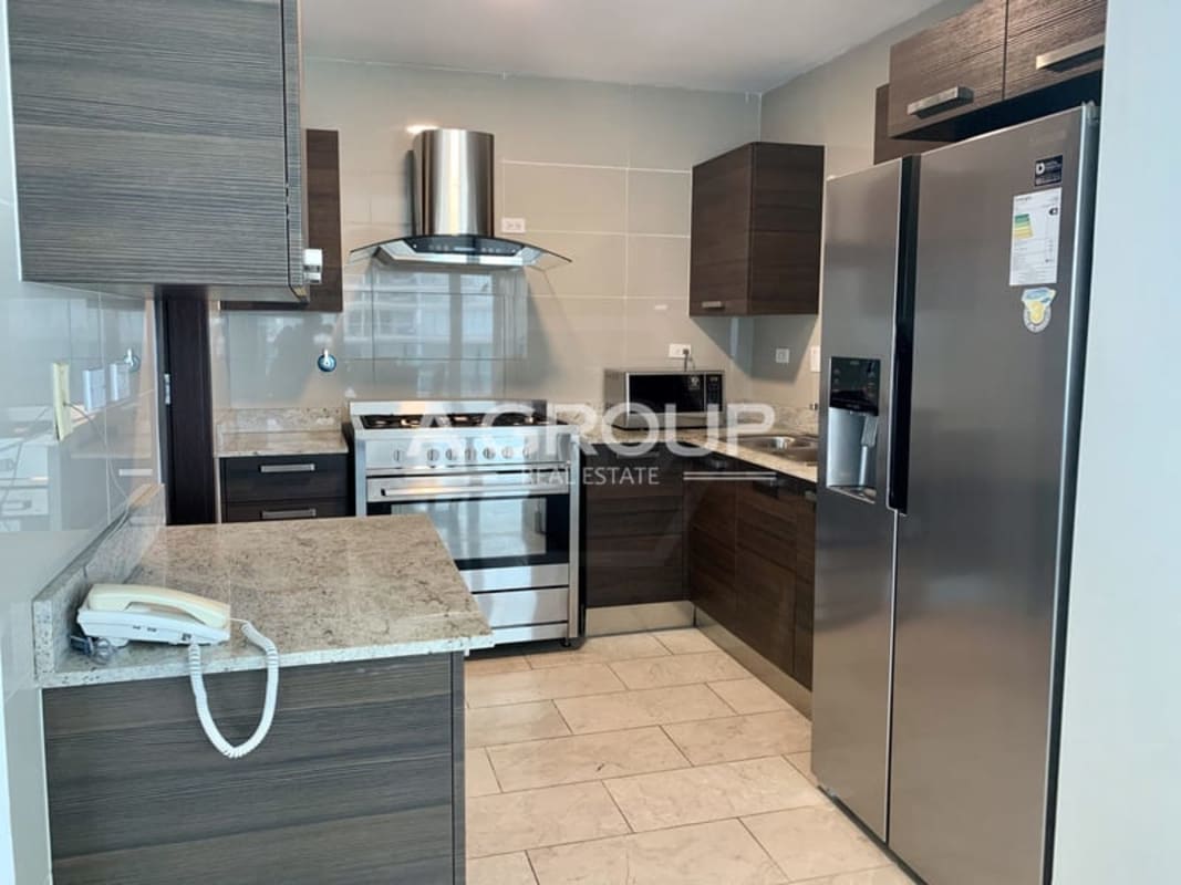 Master bedroom with panoramic sea and skyline views, luxury real estate Punta Pacifica Panama