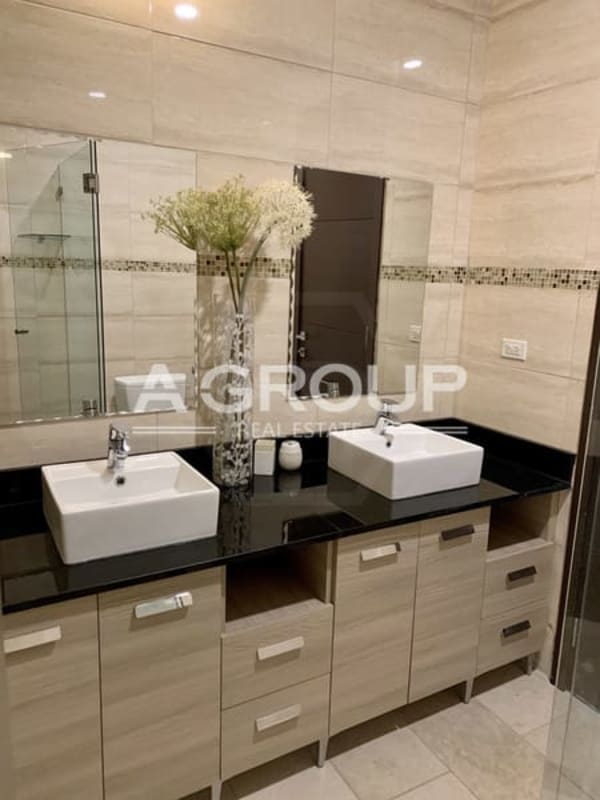 Guest bathroom with marble vanity PH Grand Tower luxury apartment Panama City