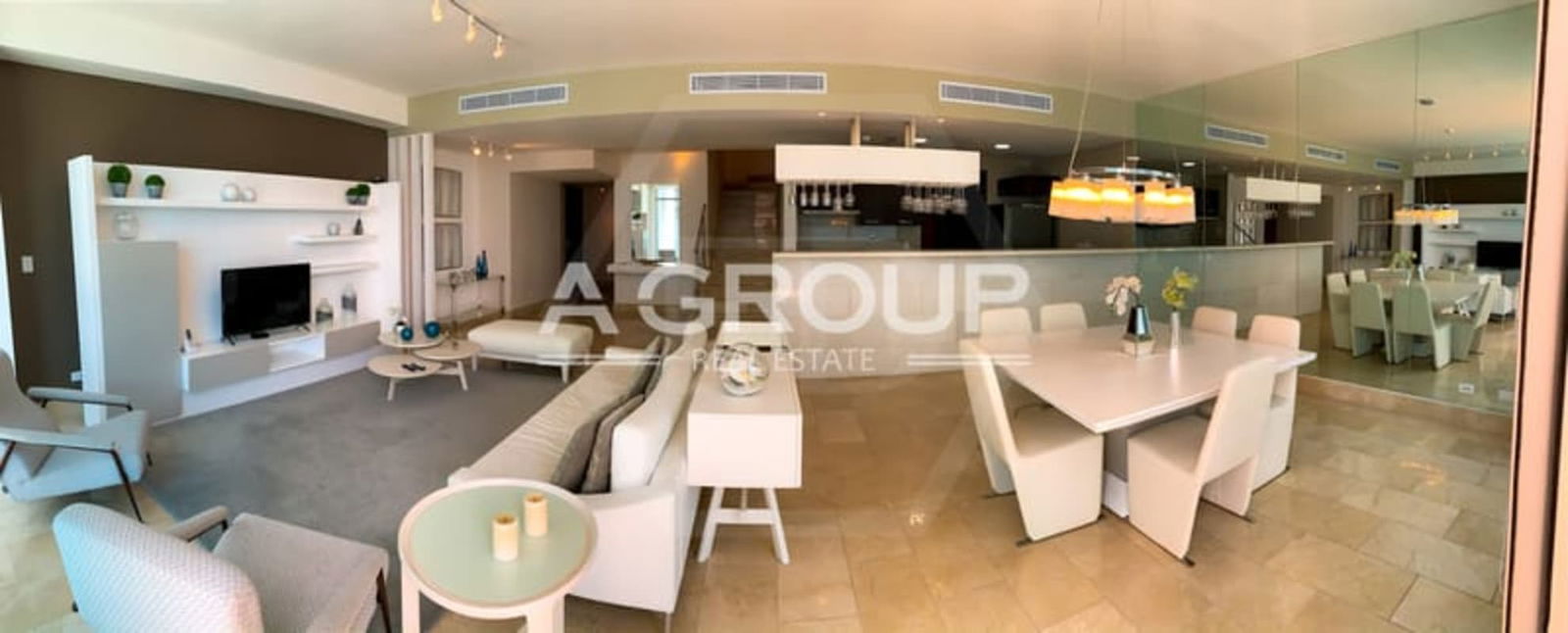 Elegant ensuite bedroom with balcony access and ocean view at Grand Tower Punta Pacífica Panama