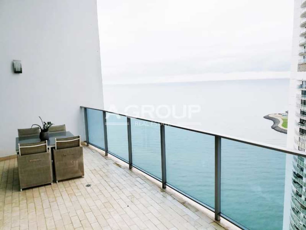 Balcony dining area with Pacific Ocean views Grand Tower Punta Pacífica Panama