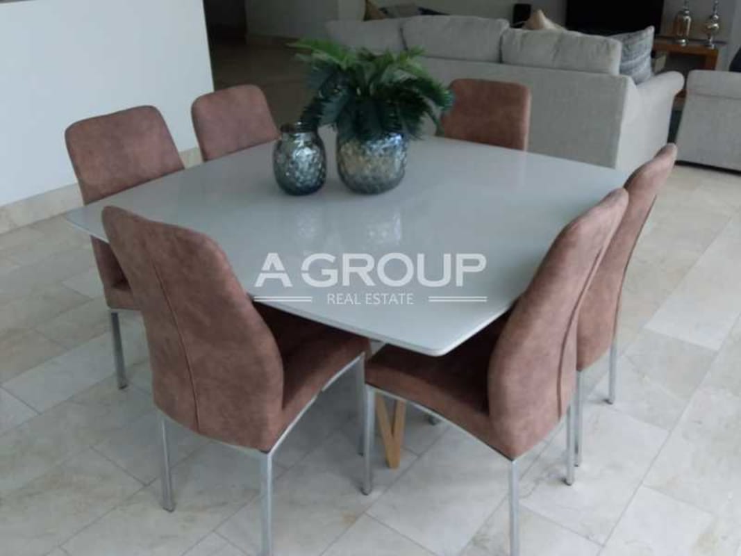 Open dining area with modern decor and natural light in PH Grand Tower Punta Pacifica Panama