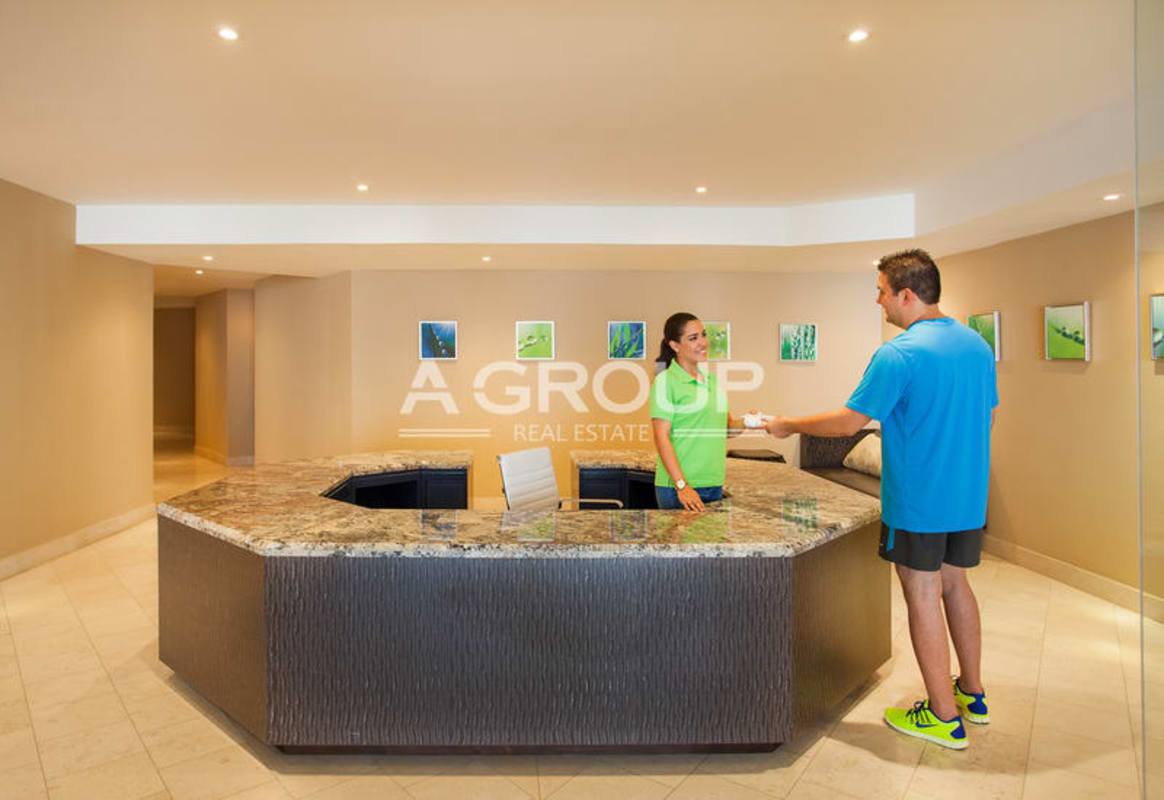 Indoor play area with colorful mural and play equipment PH Grand Tower Punta Pacifica Panama