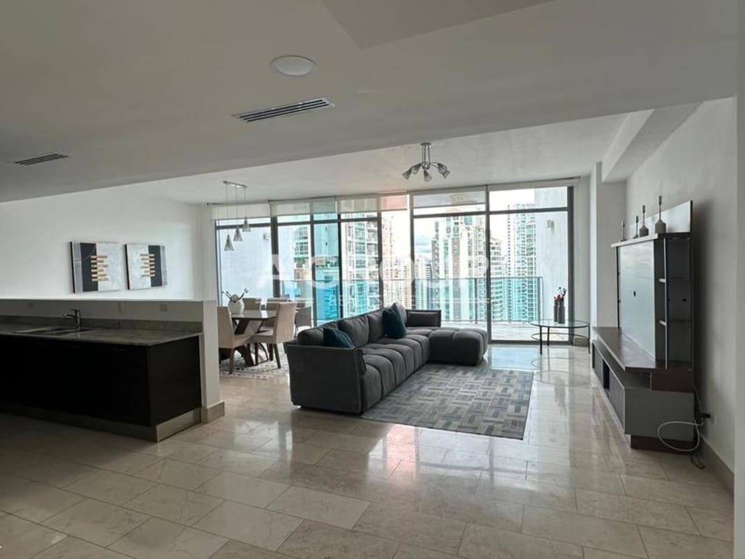 Elegant dining room with city and marina views through large windows, Grand Tower Panama City