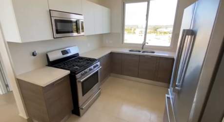 Bright kitchen with stainless appliances and ocean view in Casamar Marinazul 2 Panama
