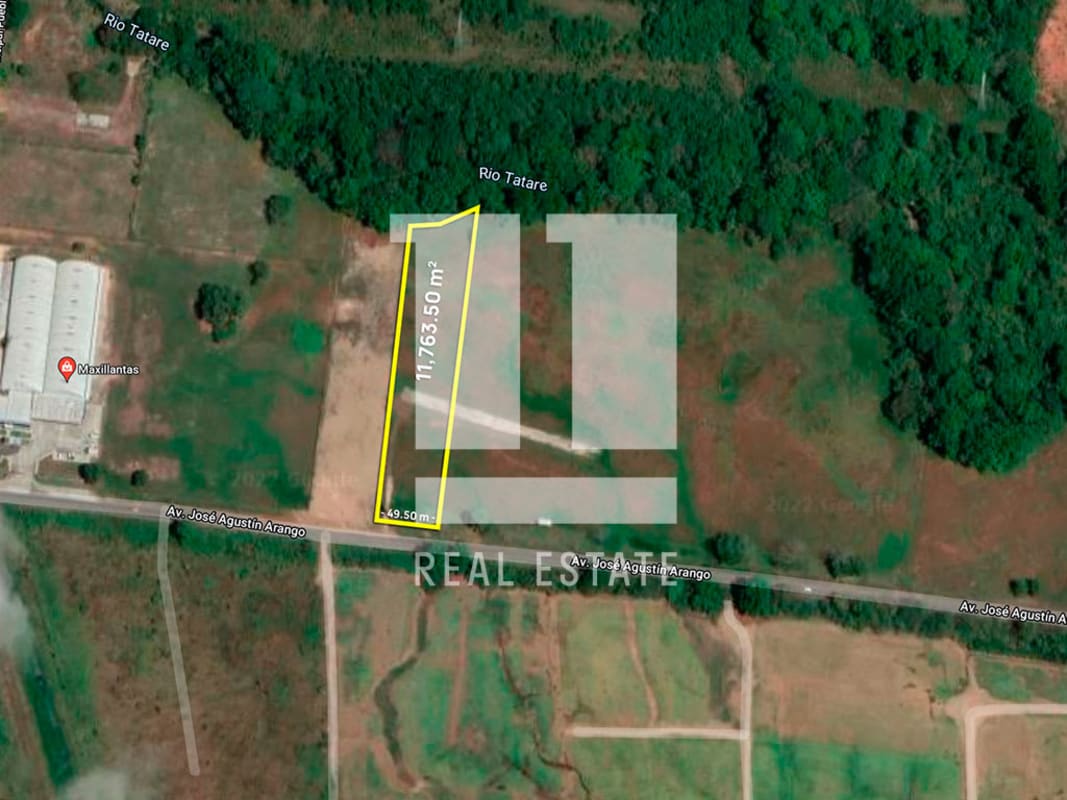 Large commercial industrial lot outlined aerially with river and industrial zones near Tocumen Airport Panama