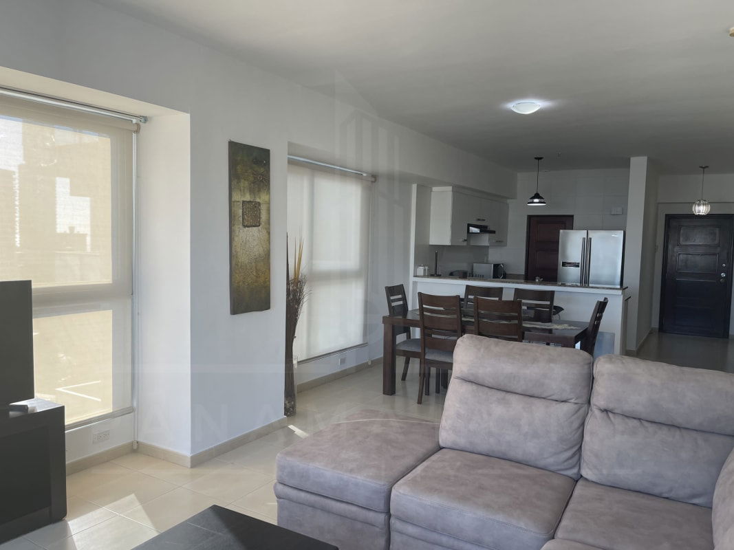 Spacious living and dining area with floor-to-ceiling windows ocean view PH BICSA Avenida Balboa