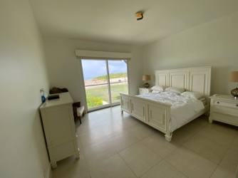 Modern bathroom with double vanity marble counters Casamar Marinazul Panama