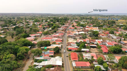 Aerial photo of Pedasí town showing main avenue, commercial district, and proximity to beaches