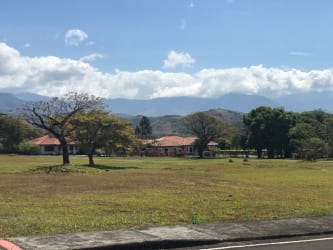 Gated entrance to Boquete Canyon Village with landscaped drive and security booth Dolega Chiriquí