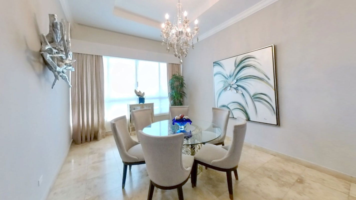 Spacious kitchen with island, built-in cabinetry, marble floors in PH Pacific Coast luxury condo Panama City