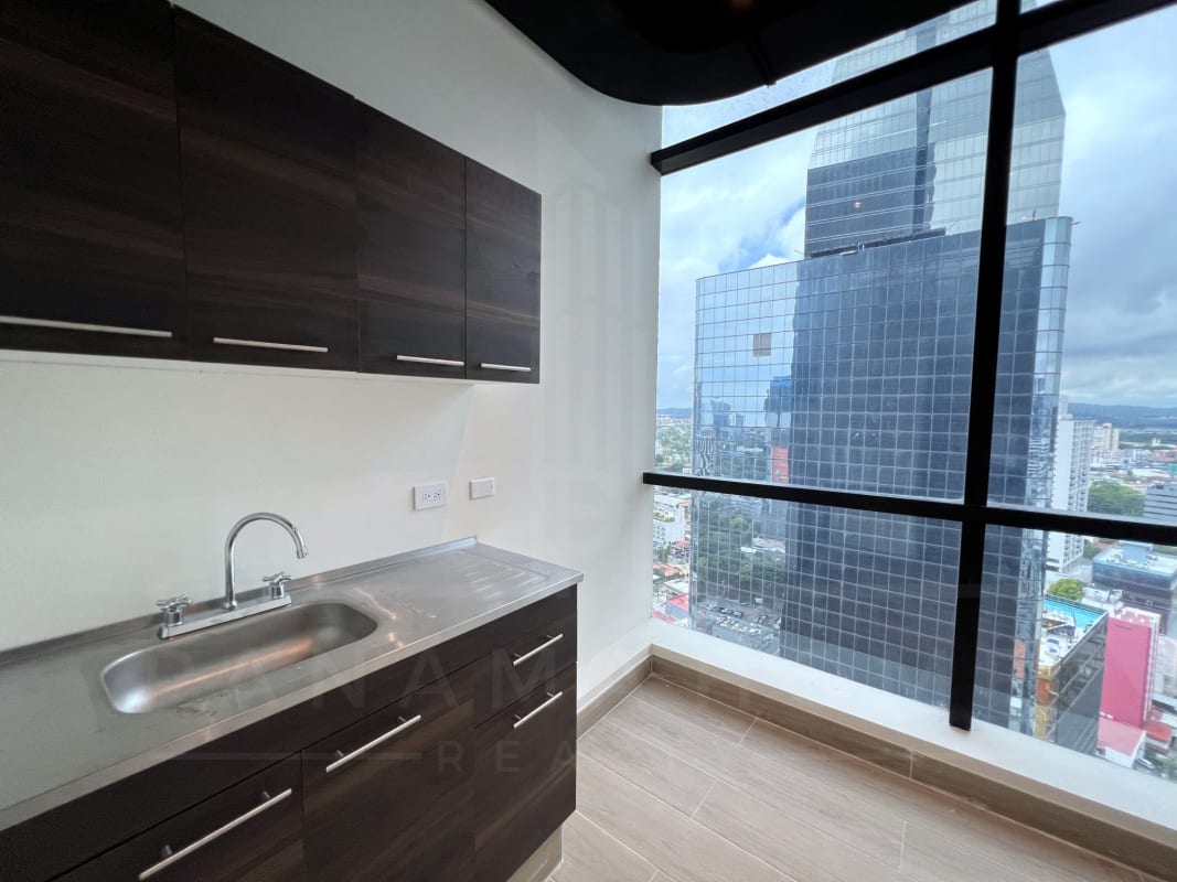 Modern private bathroom with patterned tiles inside Tower Bank office floor in Panama
