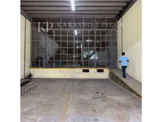 Large industrial warehouse space with ramp and glass partition in Zona Libre Colon Panama