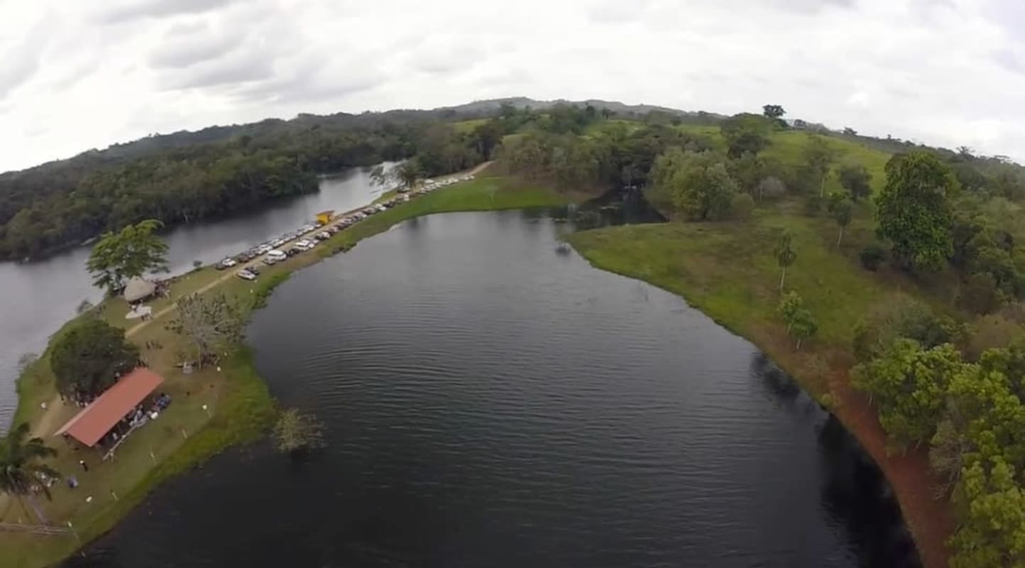 Lake and woods with a peninsula property with trees and structures at Lago Bayano Panama