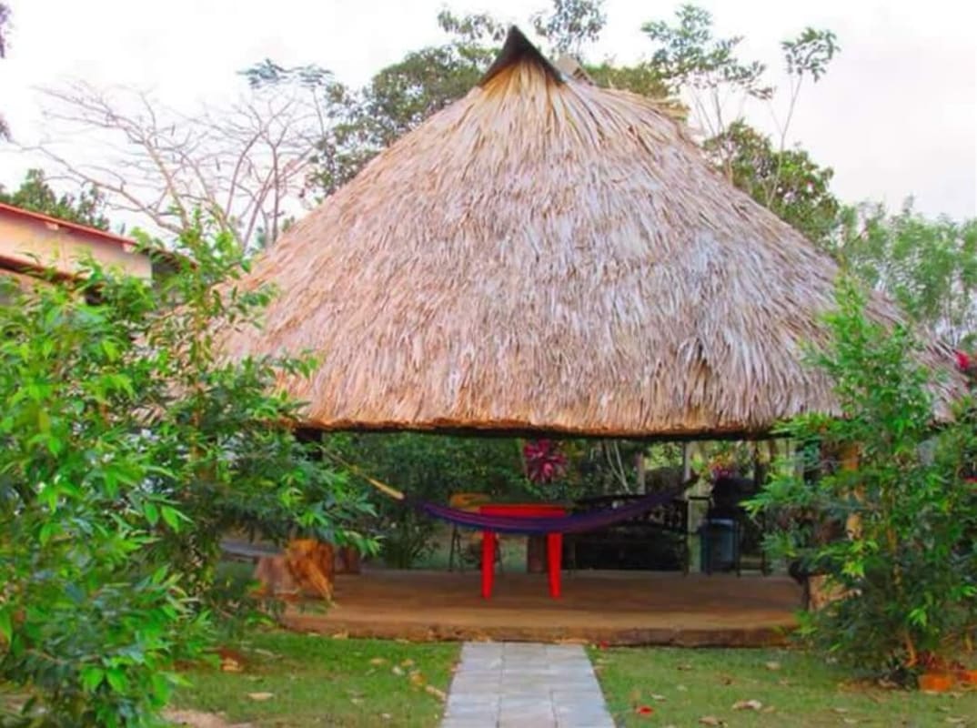 Thatched palapa hut with hammock near lakefront at Chepo Lago Bayano Panama