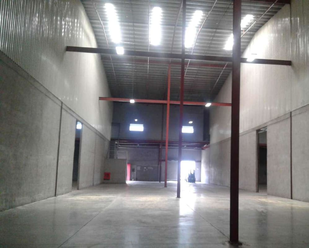 Access road and wide patio for loading trucks at warehouse complex in Nuevo Tocumen, Panama