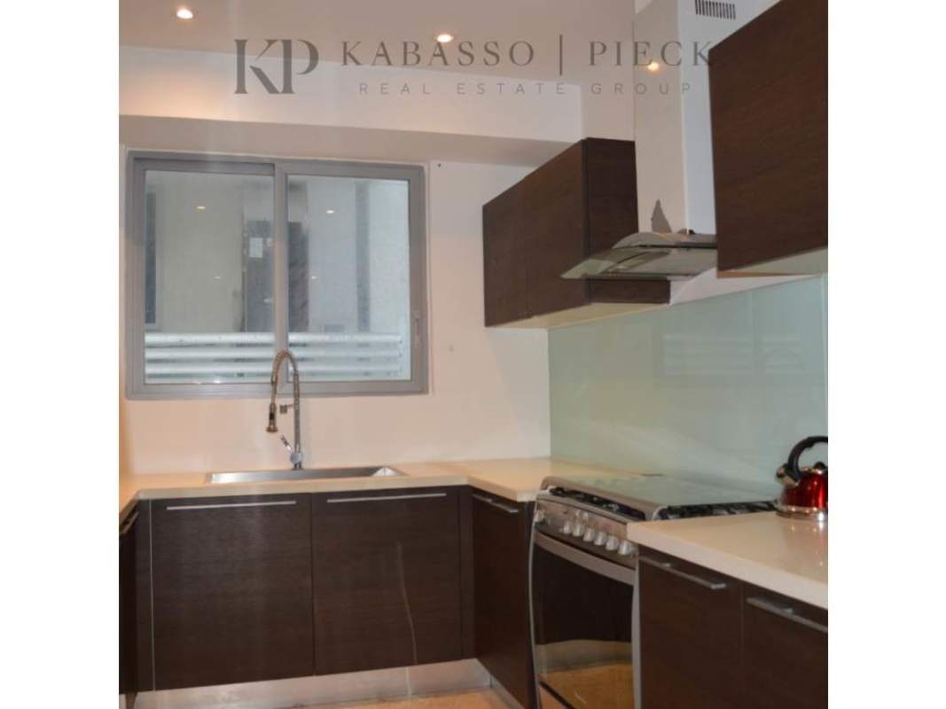 Gourmet kitchen with stylish cabinetry, gas stove and ocean light at YOO & Arts Panama