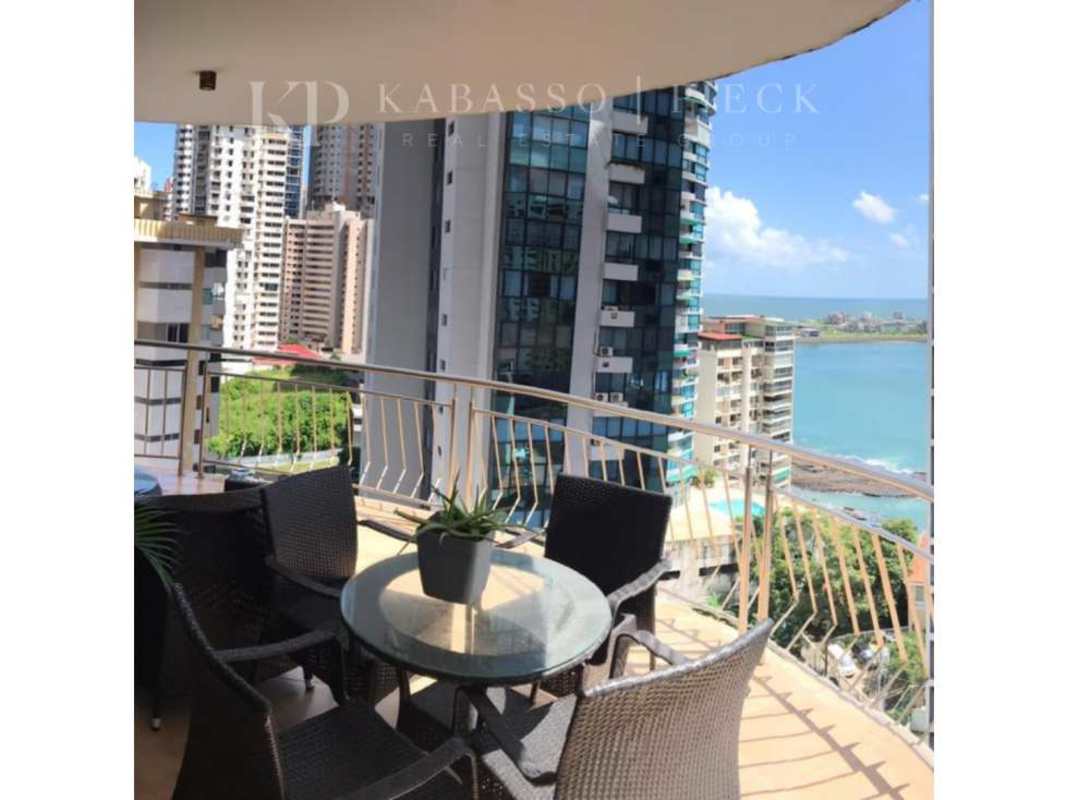 Panoramic apartment balcony with outdoor seating ocean and skyline view Panama City