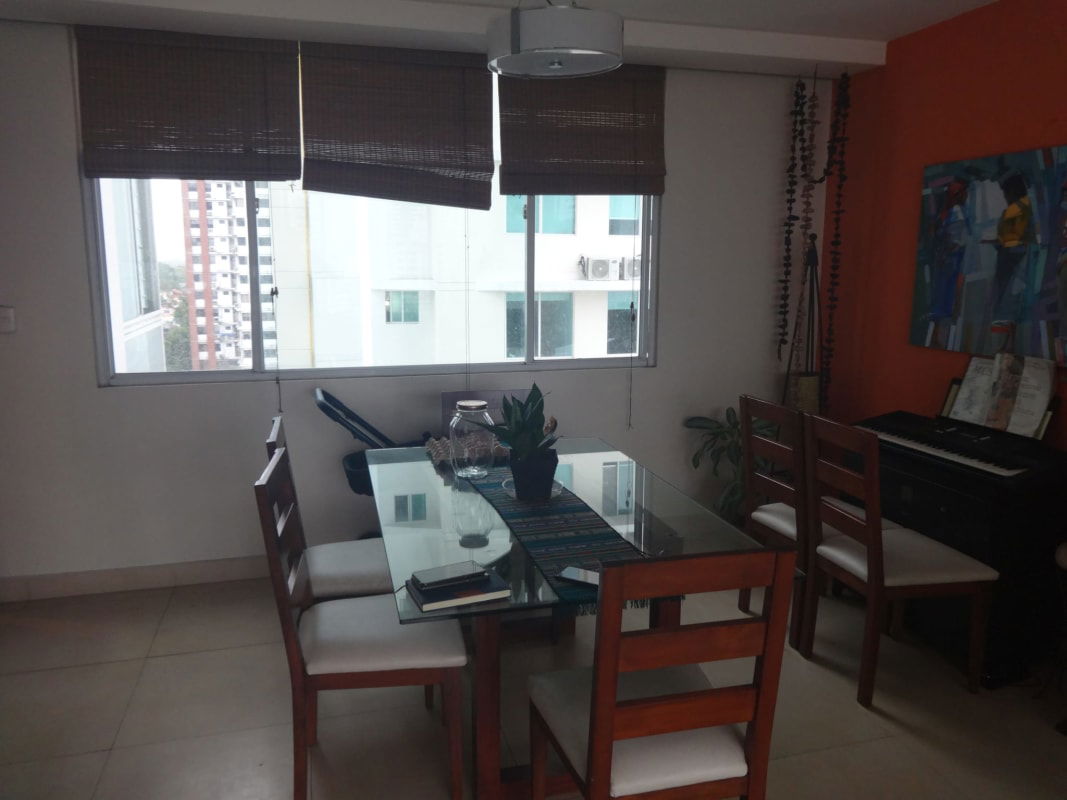Living room with ceramic tiles, city view balcony and accent wall in PH San Francisco Gardens San Francisco Panama