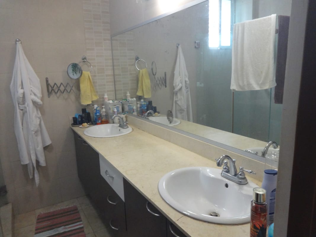 Master bedroom with ensuite bathroom and city views in PH San Francisco Gardens Panama