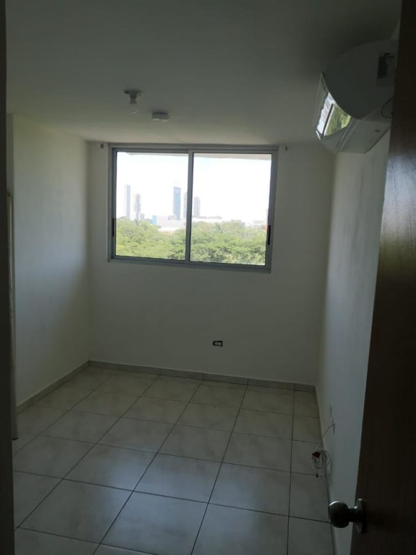 Bedroom with split air conditioner, large window in PH Residencial Llano Bonito Panama City