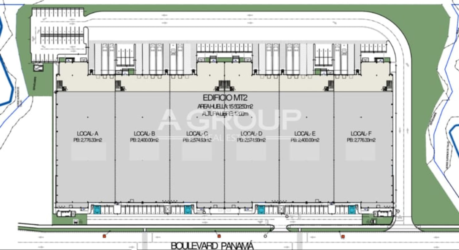Aerial image of large industrial warehouses with docks, trucks, and green area in 24 de Diciembre Panama City