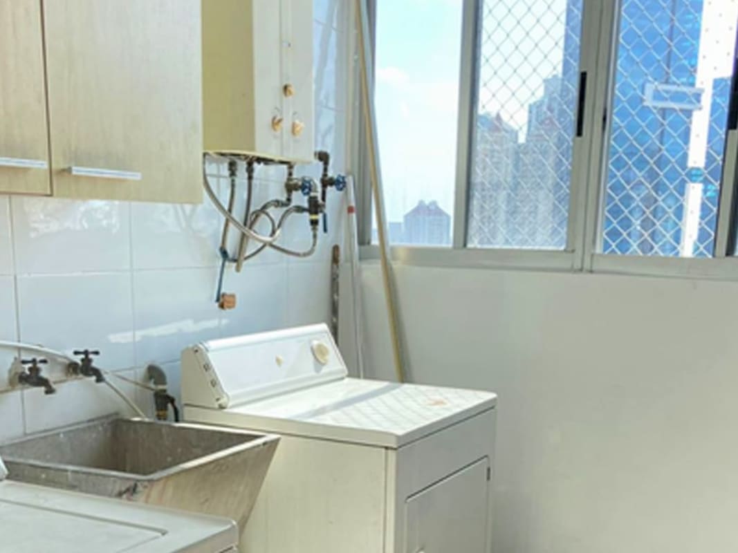 Laundry room with utility sink and natural light PH Pacific Coast San Francisco Panama