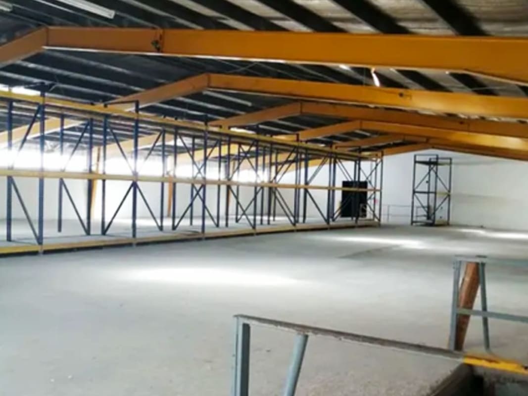 Interior view of industrial warehouse with concrete floor and high ceilings Rio Abajo Panama