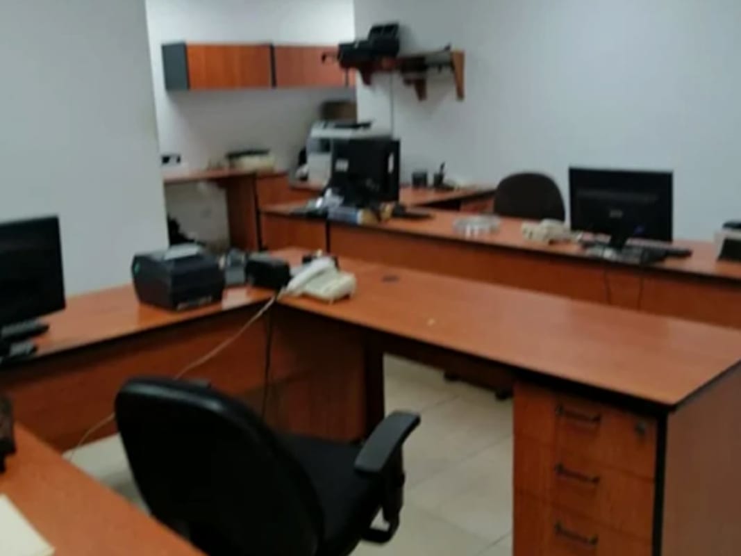 Empty warehouse with industrial metal shelving units Rio Abajo Panama