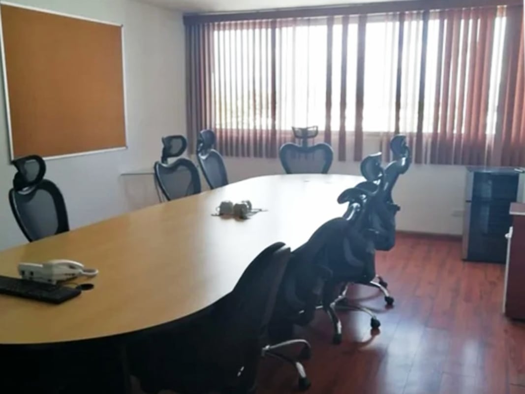 Empty industrial warehouse with high ceiling and storage shelving Rio Abajo Panama