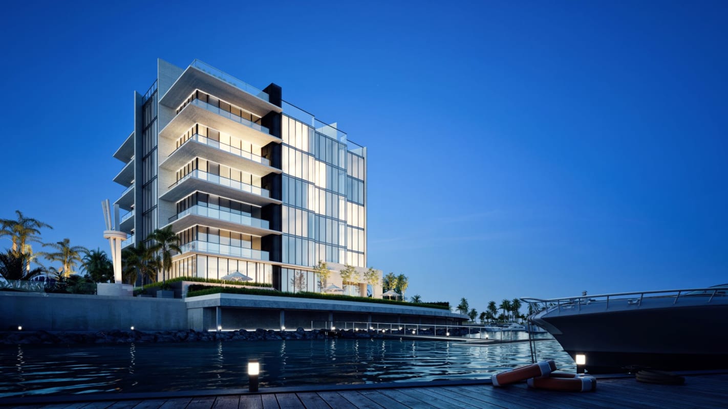 Open-plan living dining area with floor-to-ceiling windows, city and ocean views PH Montecarlo Ocean Reef