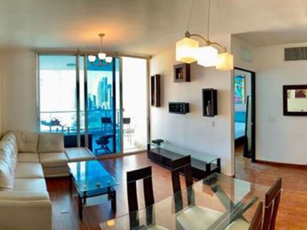 Granite countertop kitchen with appliances and wood cabinetry in PH Destiny Tower Avenida Balboa Panama