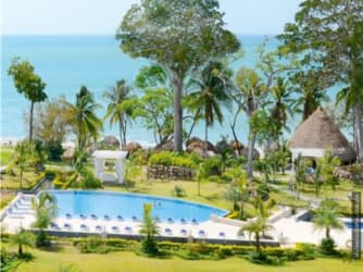 Interconnected luxury swimming pools and beachfront social area at Bijao Panama