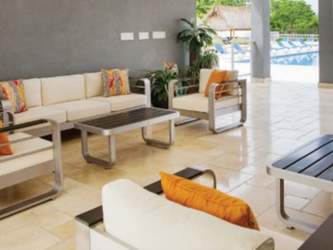 Beachfront tropical resort with pools, palm trees, ocean view at Bijao Club Panama