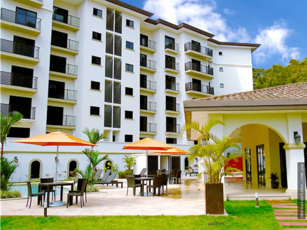 Exterior facade of Mediterranean-style apartment buildings in PH Embassy Village Clayton Panama