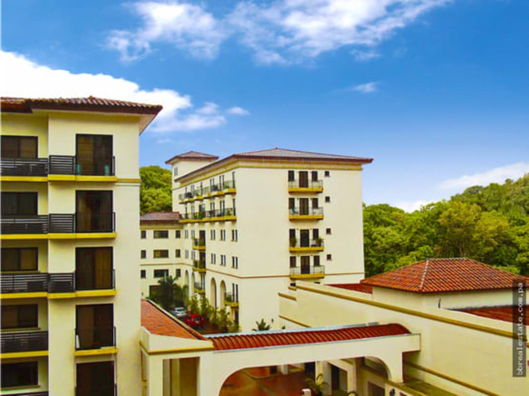 Children's play area with slides and landscaped gardens at PH Embassy Village Clayton Panama