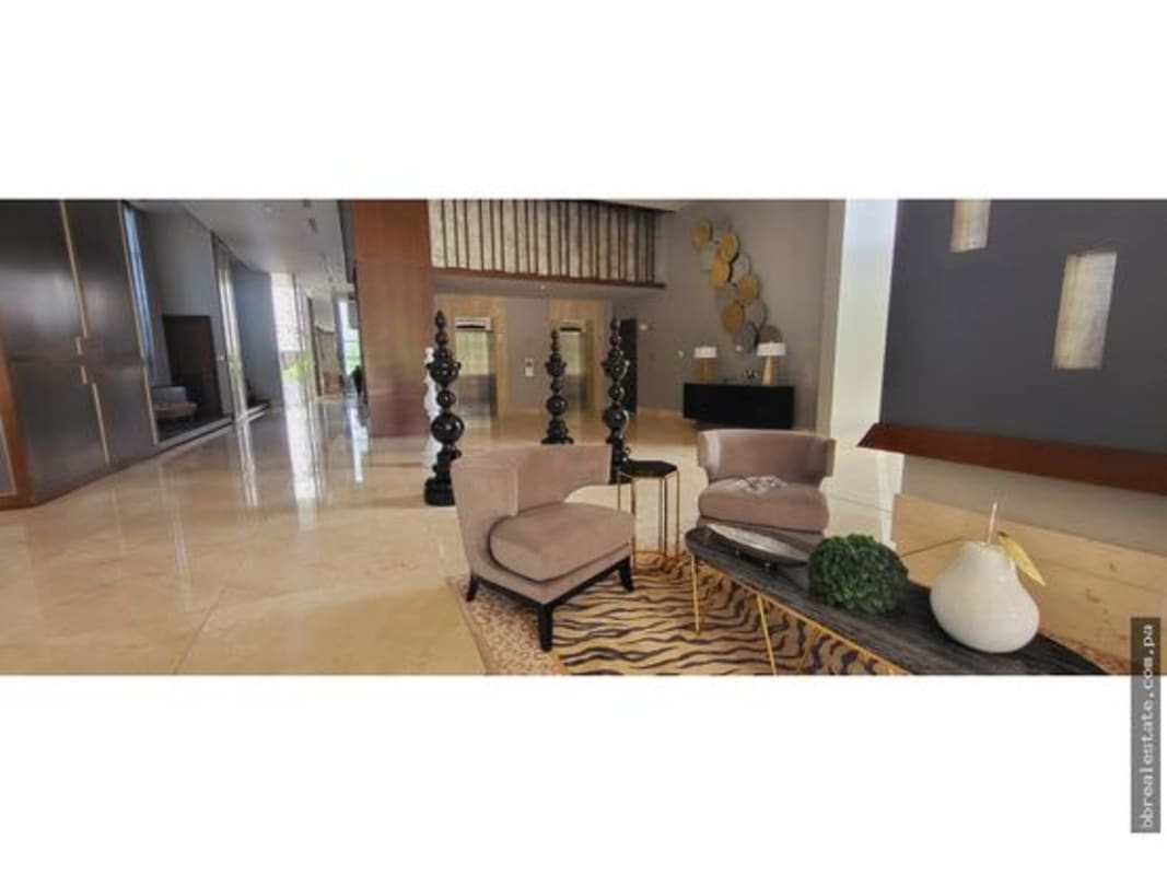 Luxury lobby entrance with reception, high ceilings, and marble floor PH Valery Point Panama