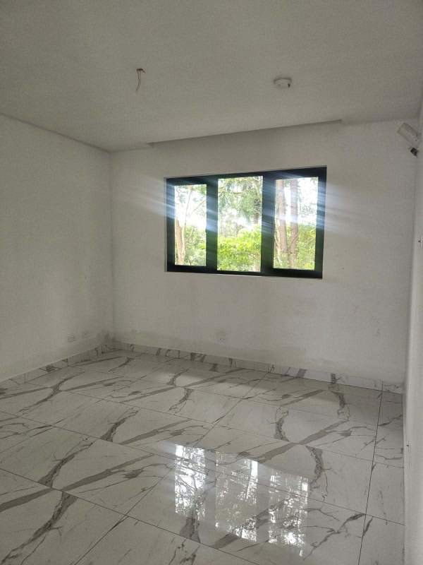 Modern under-construction duplex nestled in lush greenery Panama City Clayton neighborhood